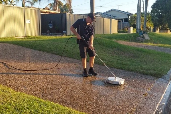 restoring a driveway with pressure cleaning in Redlands Coast